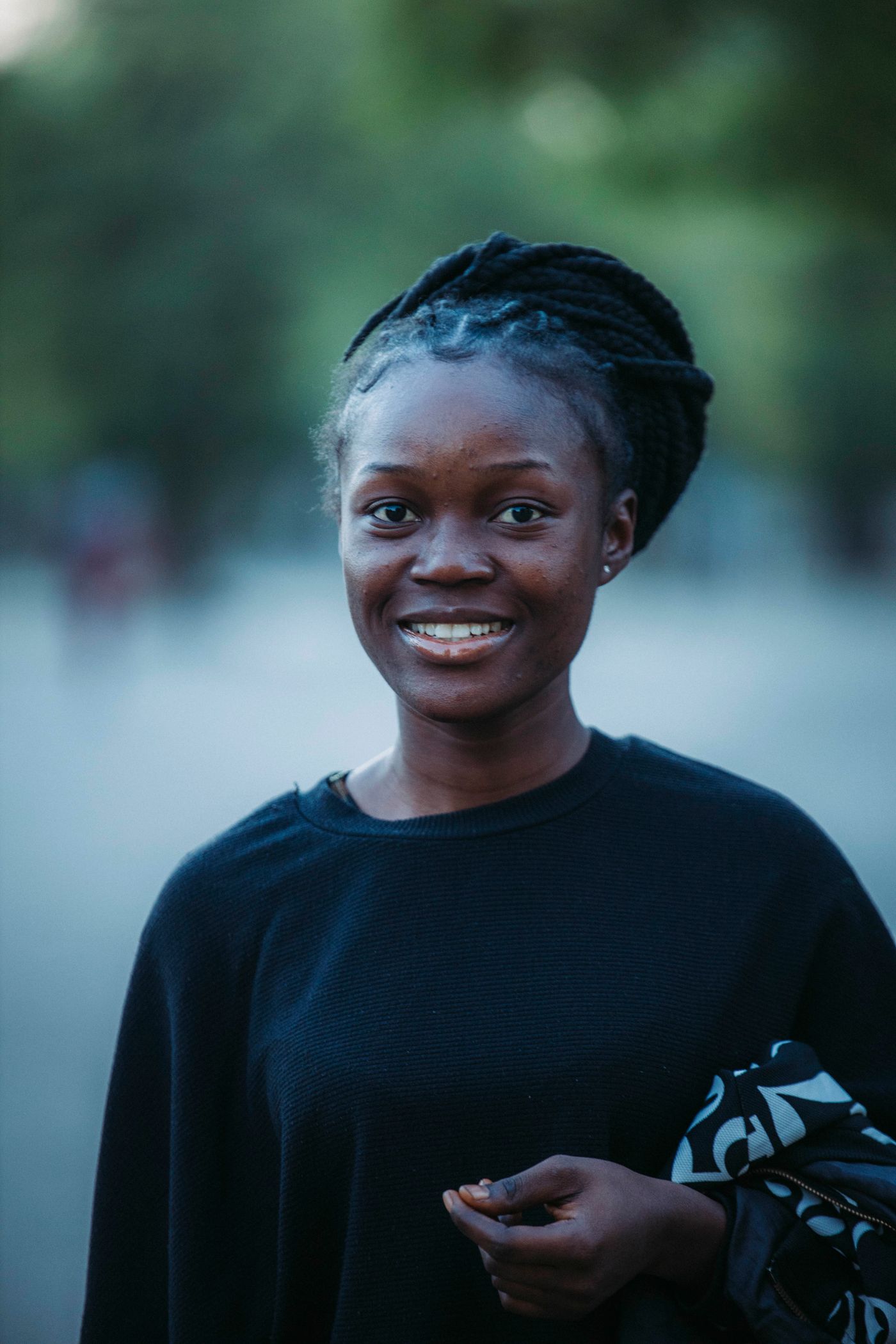 A woman with a warm, natural smile